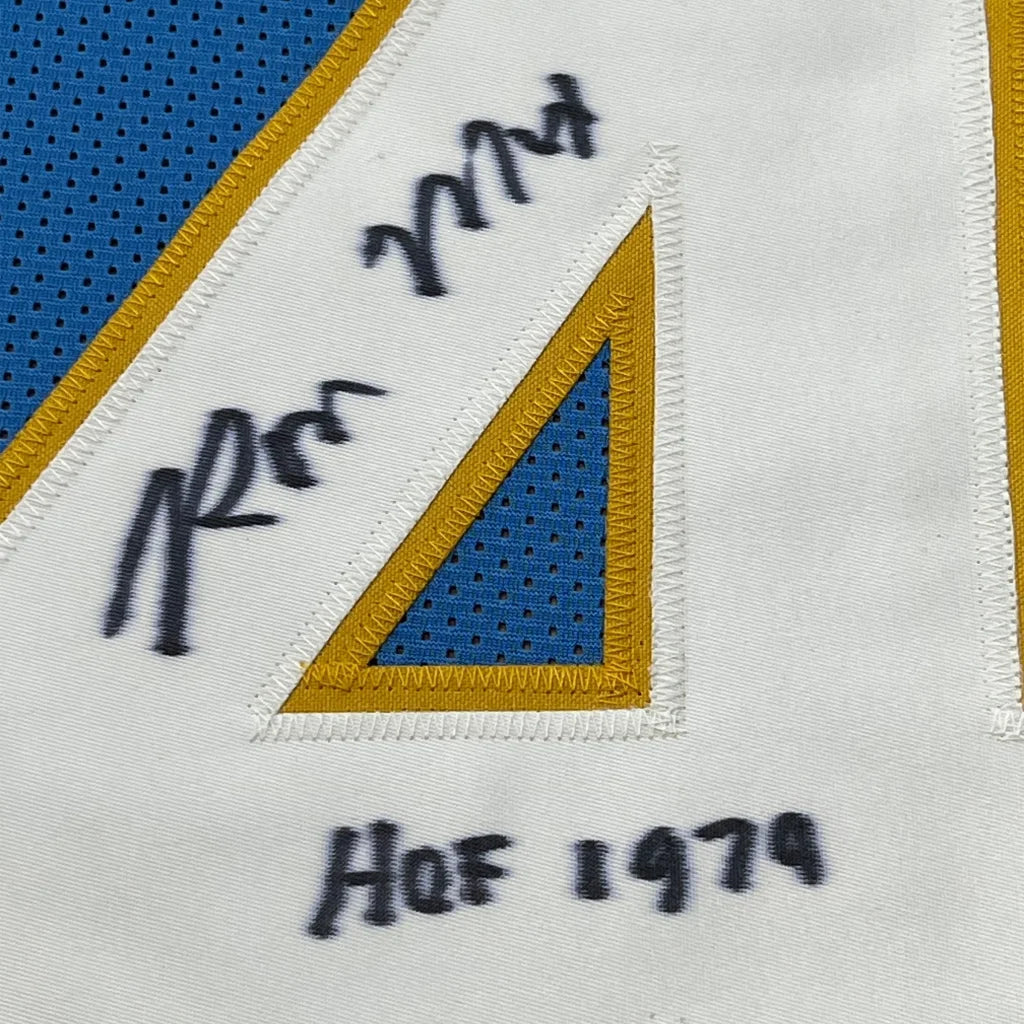 Blue and white San Diego Chargers jersey with gold trim, autographed and ready to hang