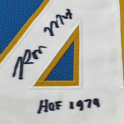 Blue and white San Diego Chargers jersey with gold trim, autographed and ready to hang