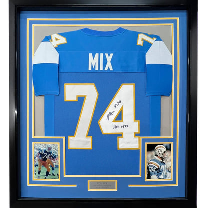 Framed autographed San Diego Chargers Mix 74 football jersey ready to hang