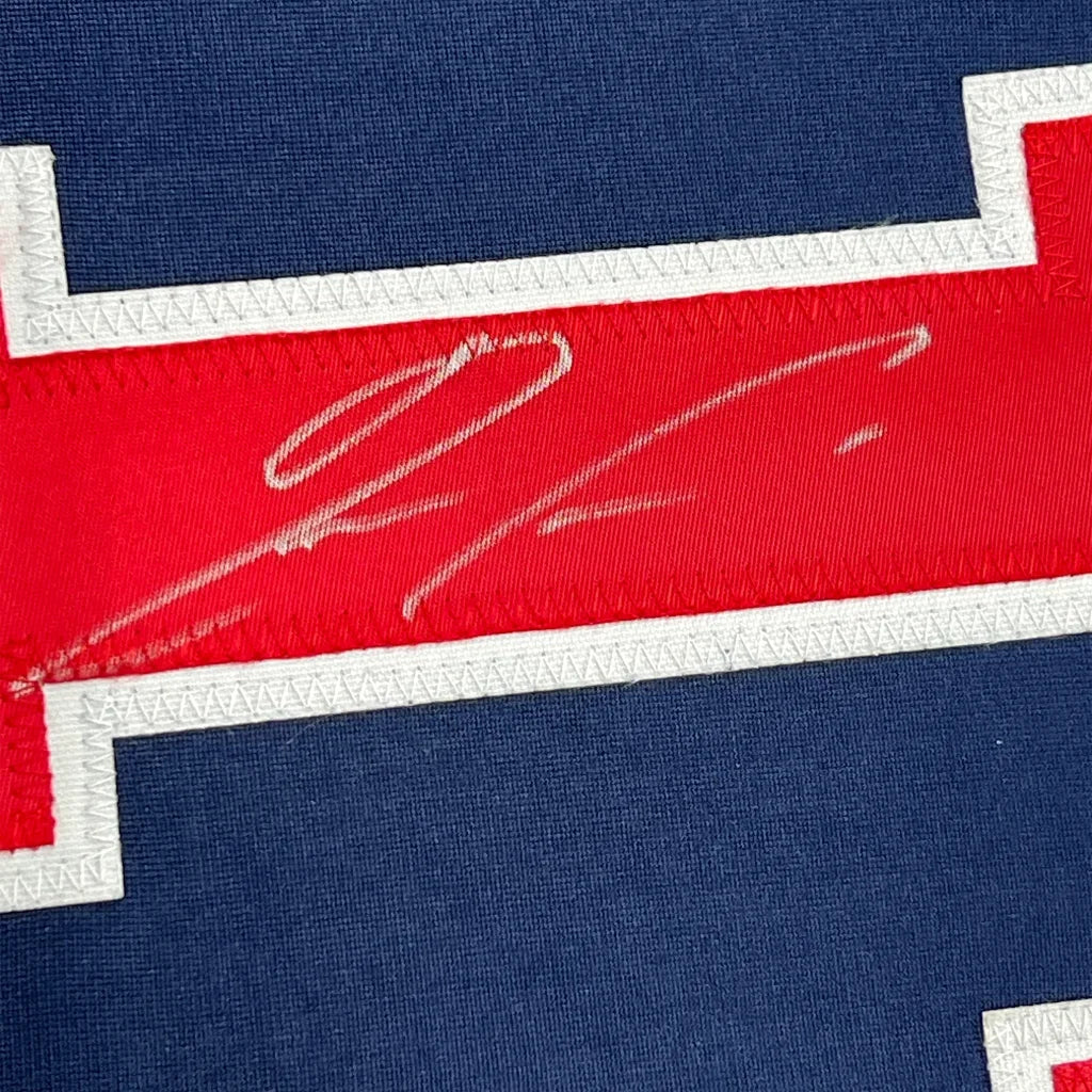 Framed autographed Ronald Acuna Jr. Atlanta Braves blue jersey with JSA COA