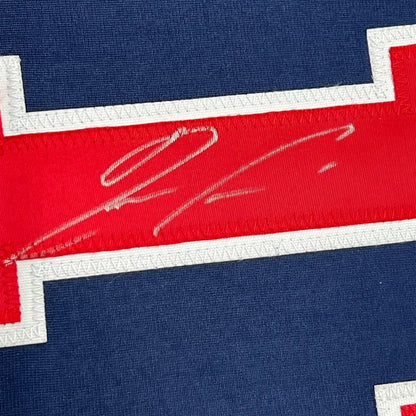 Framed autographed Ronald Acuna Jr. Atlanta Braves blue jersey with JSA COA
