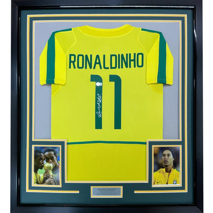 Framed autographed Ronaldinho Brazil yellow jersey, 35x39, BAS COA
