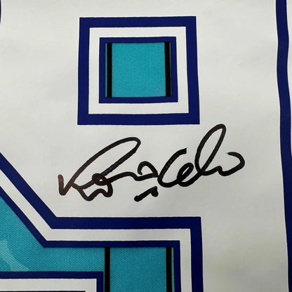 White and teal Ronaldo Barcelona jersey signed with black marker ready to display