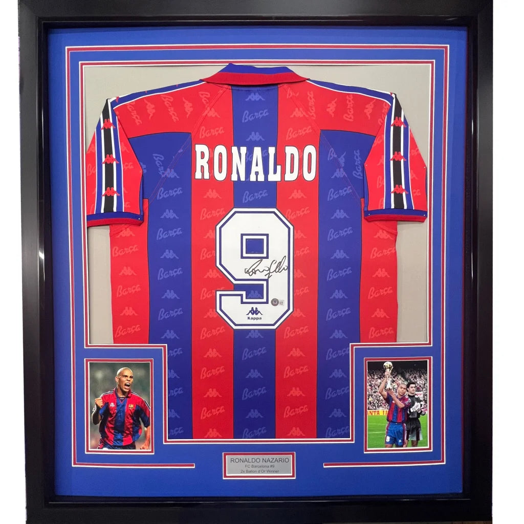 Framed autographed Ronaldo Nazario FC Barcelona red blue striped soccer jersey with Ronaldo name and number 9, Beckett BAS COA
