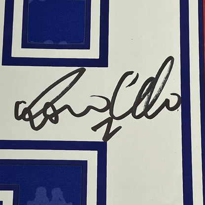 Framed autographed Ronaldo Nazario FC Barcelona jersey with black ink signature and blue borders
