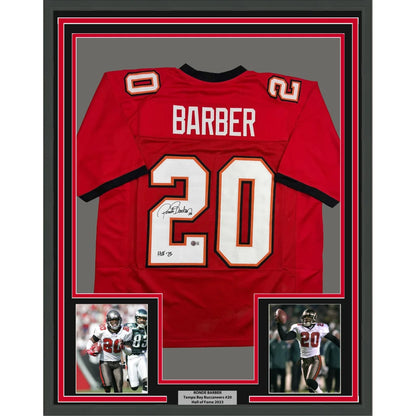 Framed Autographed Ronde Barber HOF 23 35x39 Tampa Bay Red Football Jersey Beckett BAS COA | Hall of Fame Sports Memorabilia | vintageantiquesgifts.com