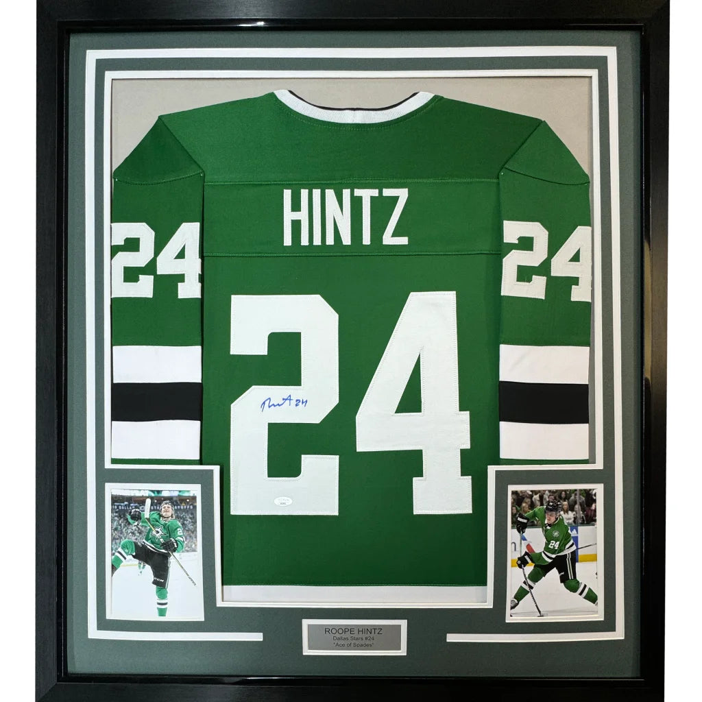 Framed signed green hockey jersey with player photos ready to hang on your wall