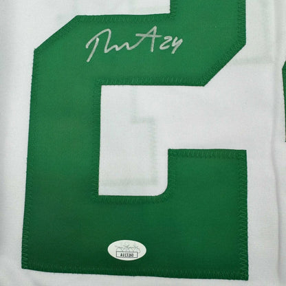 Green and white Dallas white hockey jersey with signature, authentication sticker, professionally framed