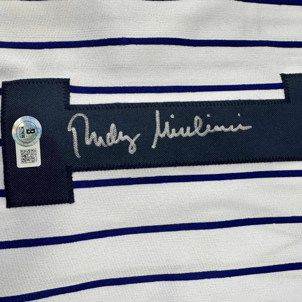 White and blue pinstripe Yankees jersey with autograph and authentication sticker
