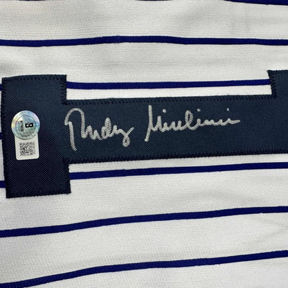 White and blue pinstripe Yankees jersey with autograph and authentication sticker