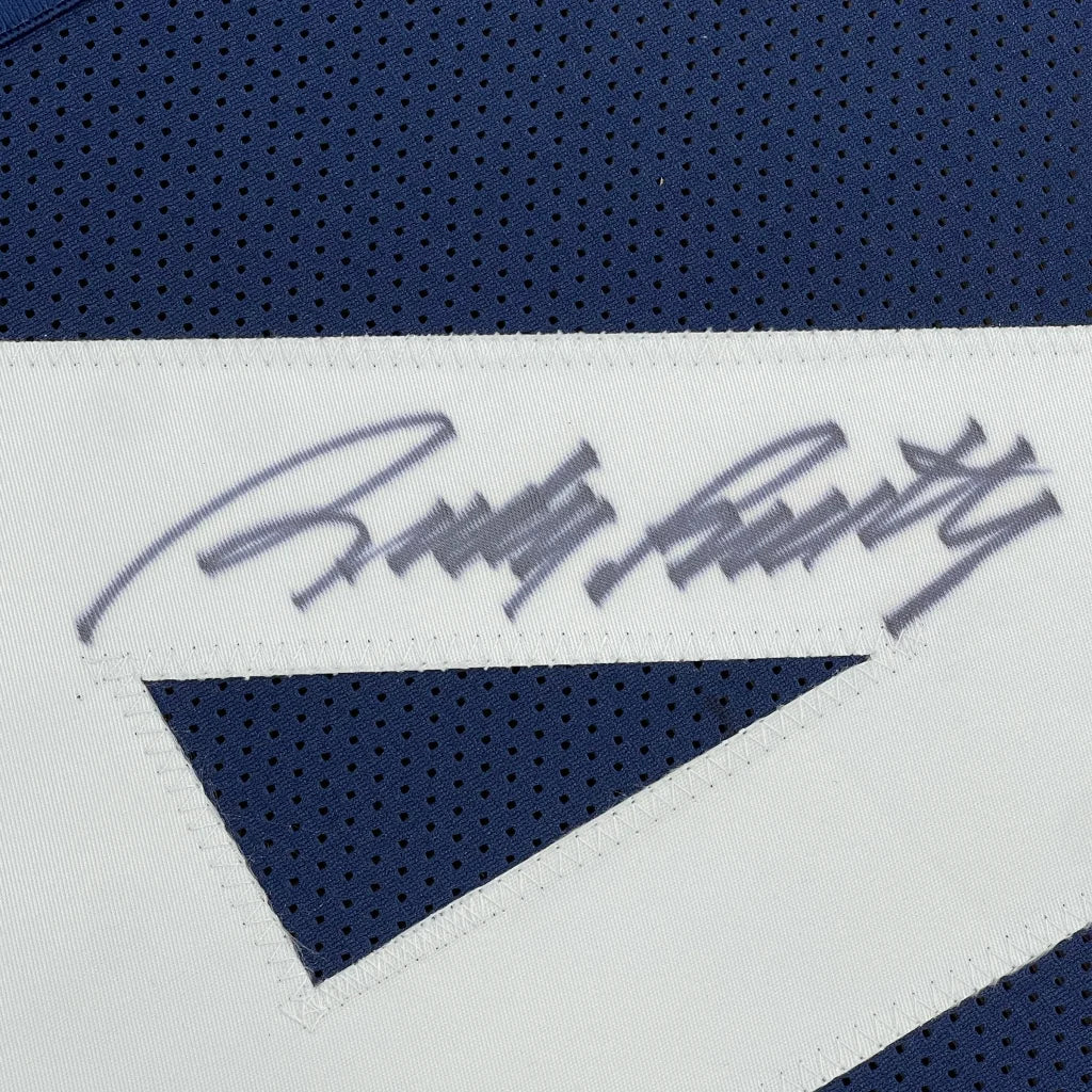 Framed Autographed Rudy Ruettiger 35x39 Notre Dame Blue College Football Jersey JSA COA | Certified Authentic Signed Memorabilia | vintageantiquesgifts.com