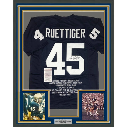 Back of framed autographed Rudy Ruettiger Notre Dame blue jersey with Ruettinger 45