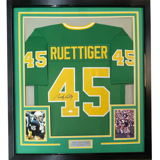 Professionally framed Notre Dame Rudy Ruettiger signed football jersey with autographs and photos