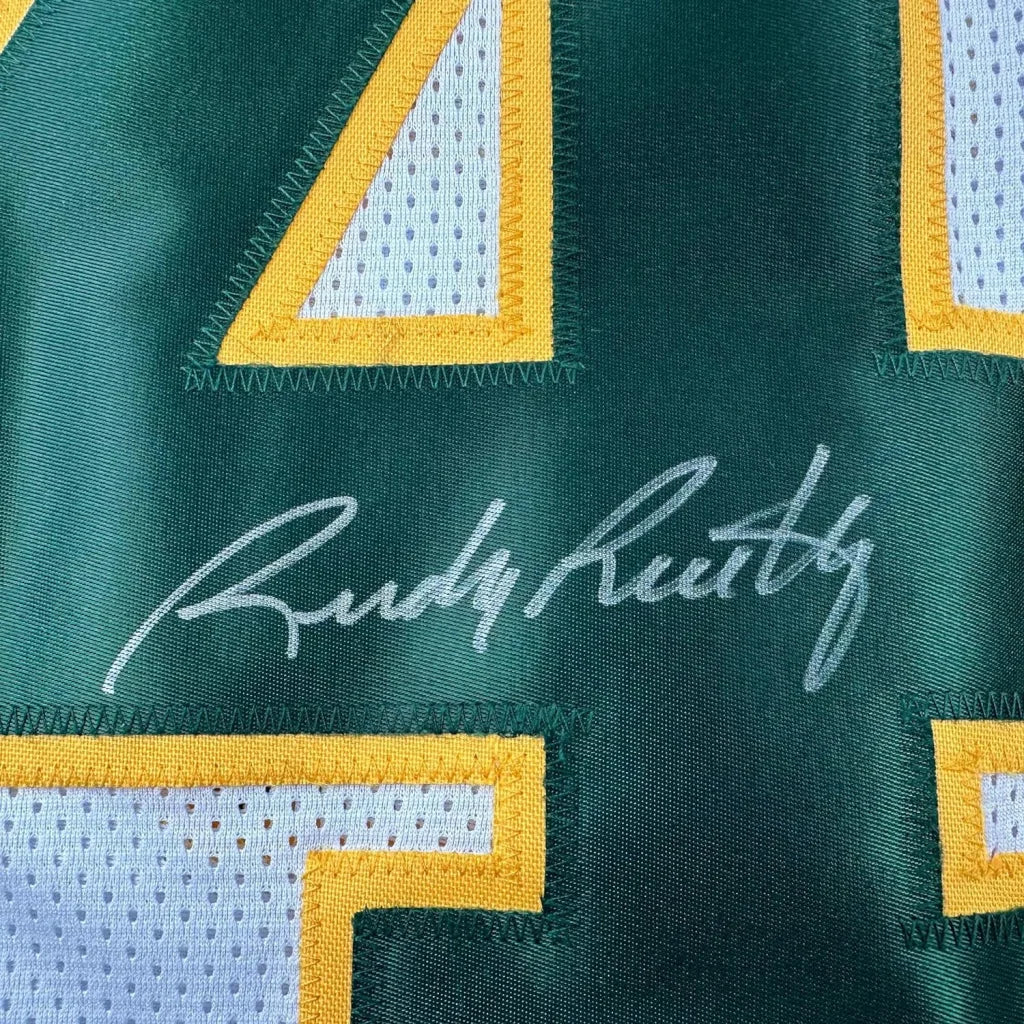 Framed Autographed Rudy Ruettiger 35x39 Notre Dame White/Green College Football Jersey JSA COA | Certified Authentic Signed Memorabilia | vintageantiquesgifts.com