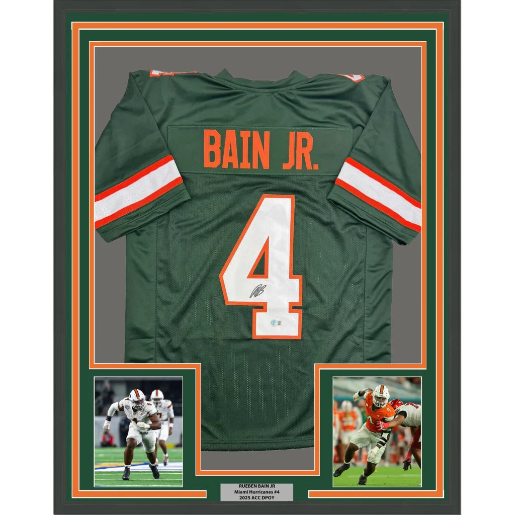 Framed autographed Rueben Bain Jr. green Miami Hurricanes jersey back with number 4