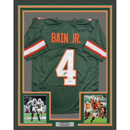 Framed autographed Rueben Bain Jr. green Miami Hurricanes jersey back with number 4