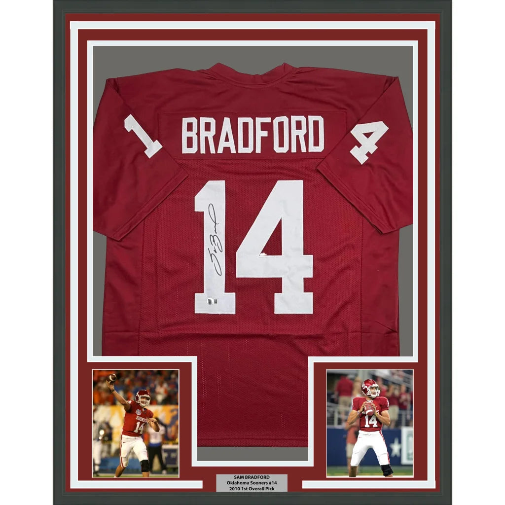 Framed Autographed Sam Bradford 35x39 Oklahoma Red College Football Jersey Beckett BAS COA | Hall of Fame Sports Memorabilia | vintageantiquesgifts.com