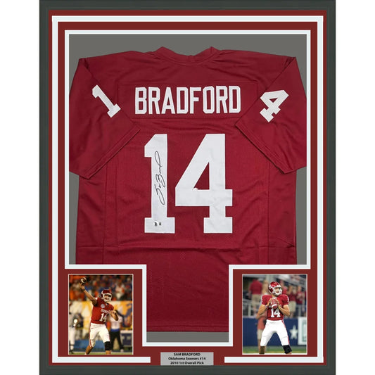 Framed Autographed Sam Bradford 35x39 Oklahoma Red College Football Jersey Beckett BAS COA | Hall of Fame Sports Memorabilia | vintageantiquesgifts.com