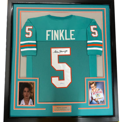 Framed signed Sean Young Ray Finkle teal Miami Dolphins jersey with number 5