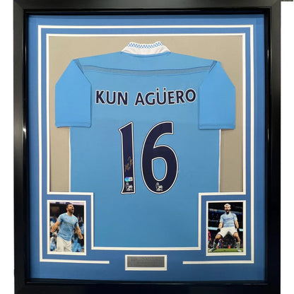 Framed Autographed Sergio Kun Aguero 35x39 Manchester City Blue Soccer Futbol Jersey Beckett BAS COA | Hall of Fame Sports Memorabilia | vintageantiquesgifts.com