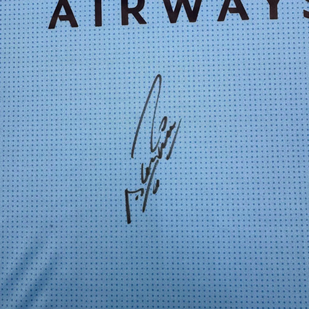 Light blue Manchester City jersey signed by Sergio Kun Aguero for your man cave