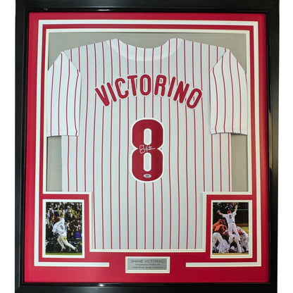 Professionally framed Shane Victorino autographed Phillies jersey with action photos and nameplate