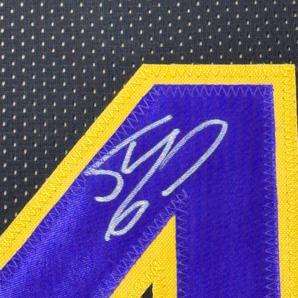 Autographed purple and yellow Lakers jersey professionally framed for Shaquille ONeal fans