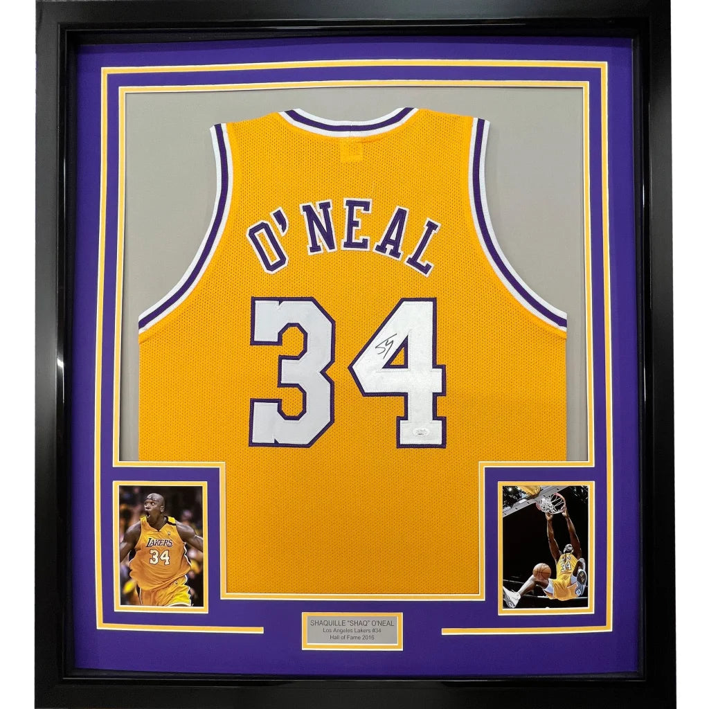 Framed Shaquille O’Neal Lakers autographed jersey with photos, perfect for fans