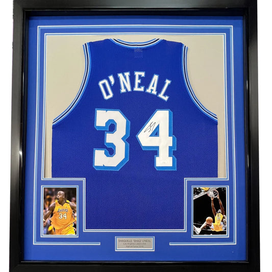 Framed autographed blue los angeles lakers basketball jersey with white o neal 34 lettering signed by shaquille o neal