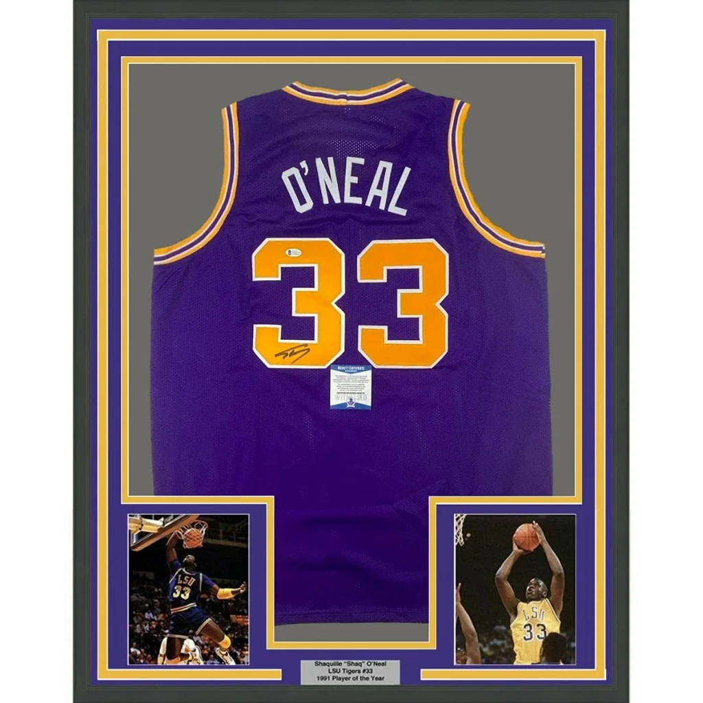 Framed autographed Shaquille ONeal #33 purple Lakers jersey with photos