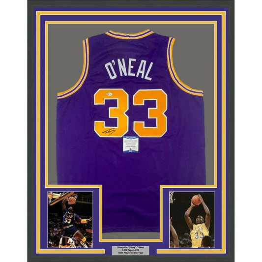 Framed autographed Shaquille ONeal #33 purple Lakers jersey with photos