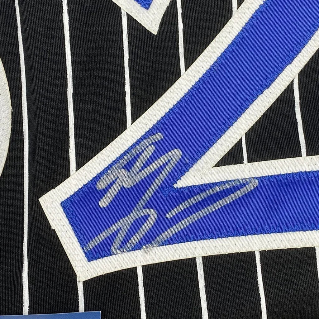 Framed autographed Shaquille ONeal Orlando black pinstripe jersey back with blue 2
