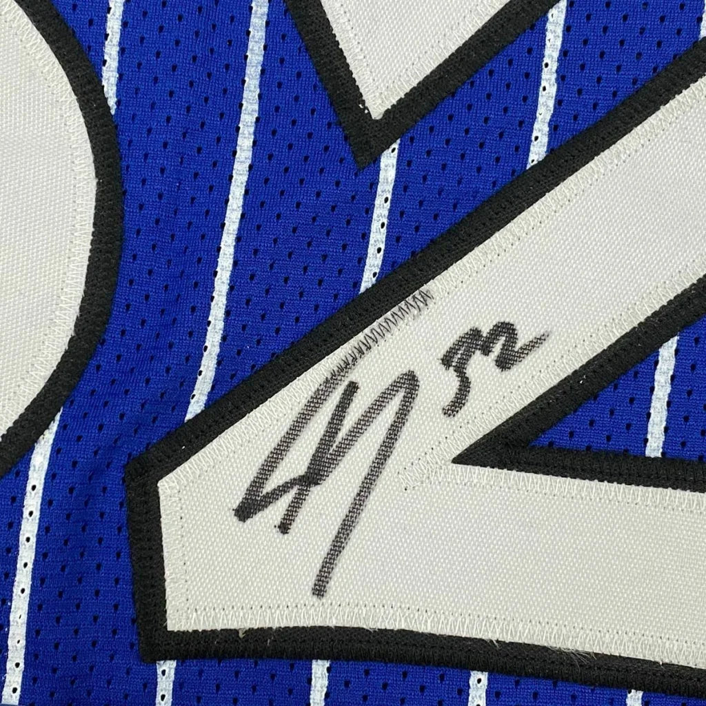 Framed Autographed Shaquille Shaq O'Neal 35x39 Orlando Blue Pinstripe Basketball Jersey Beckett BAS COA | Certified Authentic Signed Memorabilia | vintageantiquesgifts.com
