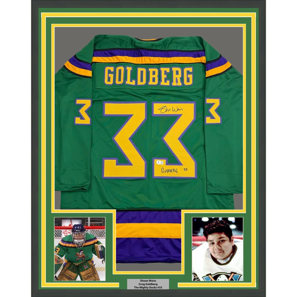 Framed Autographed Shaun Weiss Greg Goldberg 35x39 The Mighty Ducks Green Hockey Jersey Beckett BAS COA | Hall of Fame Sports Memorabilia | vintageantiquesgifts.com