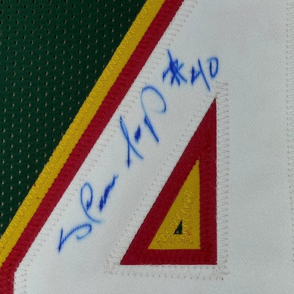Framed autographed Shawn Kemp Seattle dark green basketball jersey