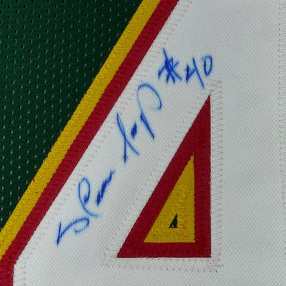 Framed autographed Shawn Kemp Seattle dark green basketball jersey