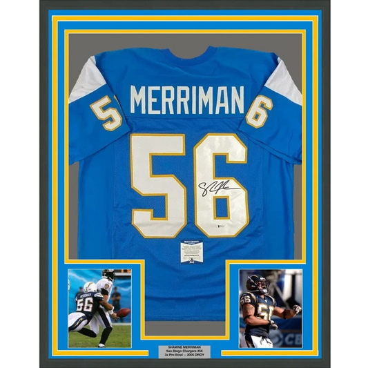 Framed signed Shawne Merriman San Diego Chargers jersey with player photos for man cave