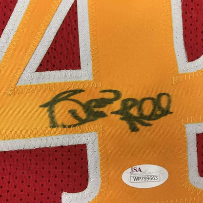Framed autographed orange and red mesh spud webb basketball jersey with white trim and black ink signature