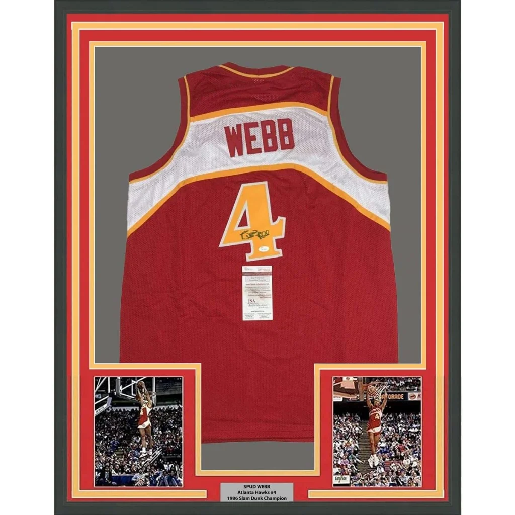 Back side of a red and white atlanta hawks basketball jersey with number 4 and signed by spud webb framed 35x39