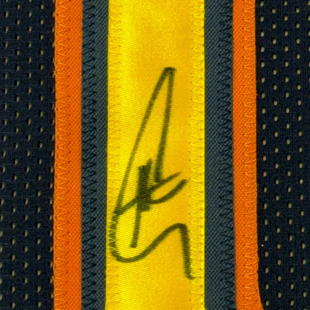 Autographed yellow and orange Golden State Warriors jersey professionally framed for display