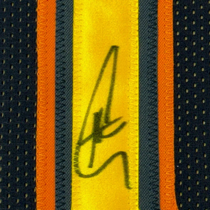 Autographed yellow and orange Golden State Warriors jersey professionally framed for display