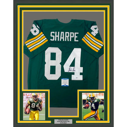 Back side of framed autographed green and yellow green bay packers sterling sharpe jersey with white number 84 and signature