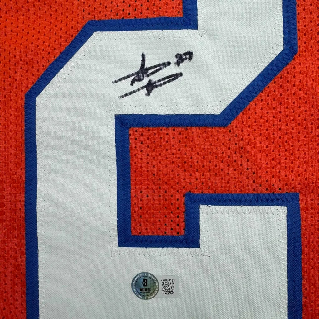 Retro orange Steve Atwater Broncos jersey with white blue number 6 and black autograph