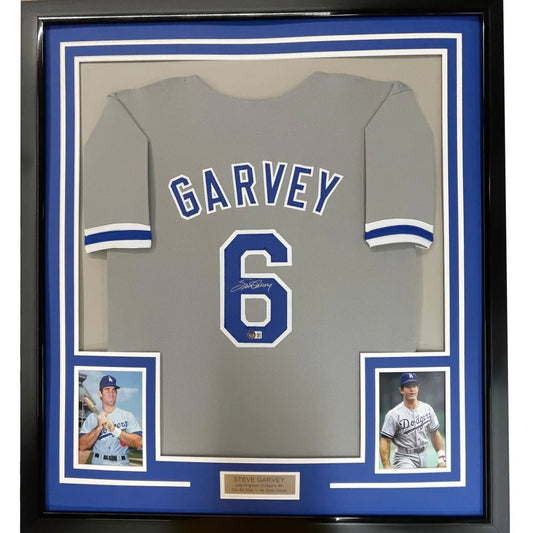 Professionally framed Steve Garvey Dodgers autographed jersey with photos and plaque