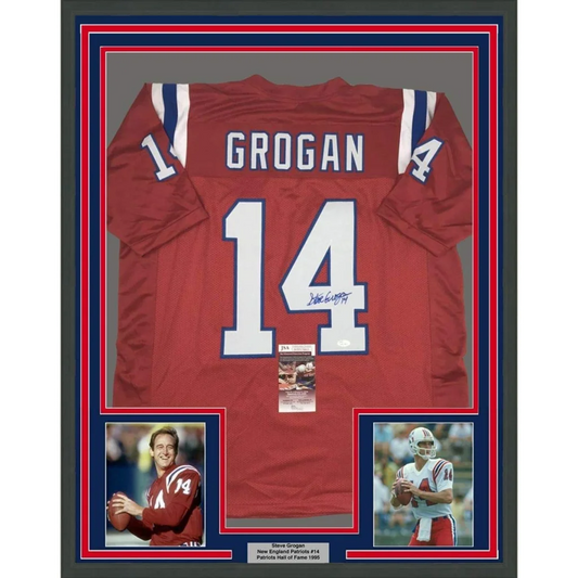 Framed autographed red new england patriots football jersey with white and blue number 14 signed by steve grogan