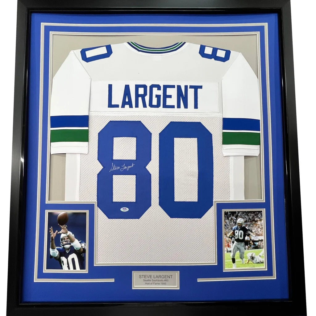 Framed autographed Steve Largent Seattle Seahawks white jersey with green stripes PSA/DNA COA