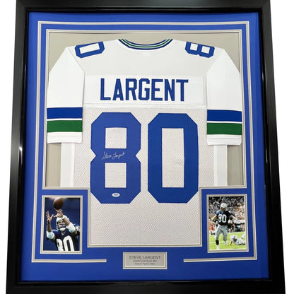 Framed autographed Steve Largent Seattle Seahawks white jersey with green stripes PSA/DNA COA