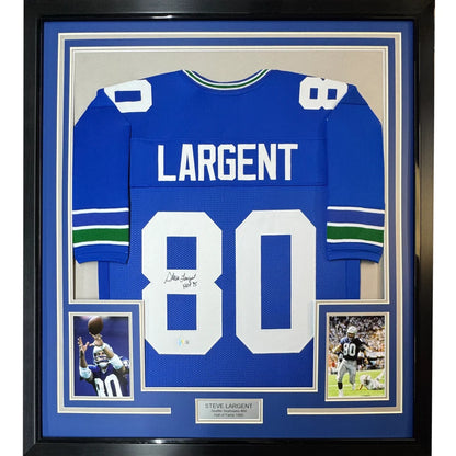 Framed, autographed Steve Largent #80 football jersey with photos for display
