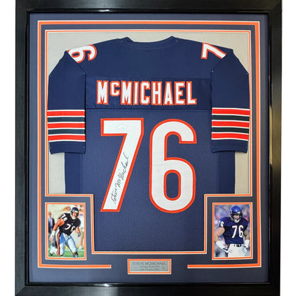 Framed autographed Steve McMichael Chicago Bears navy blue jersey with number 76