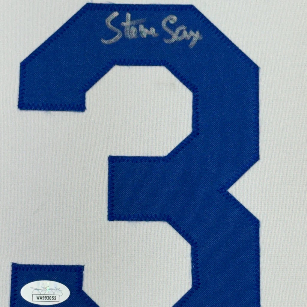 Blue Steve Sax jersey with silver autograph ready for display